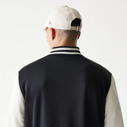 The model is wearing this NBA Chicago Bulls Bomber Jacket in black. 8