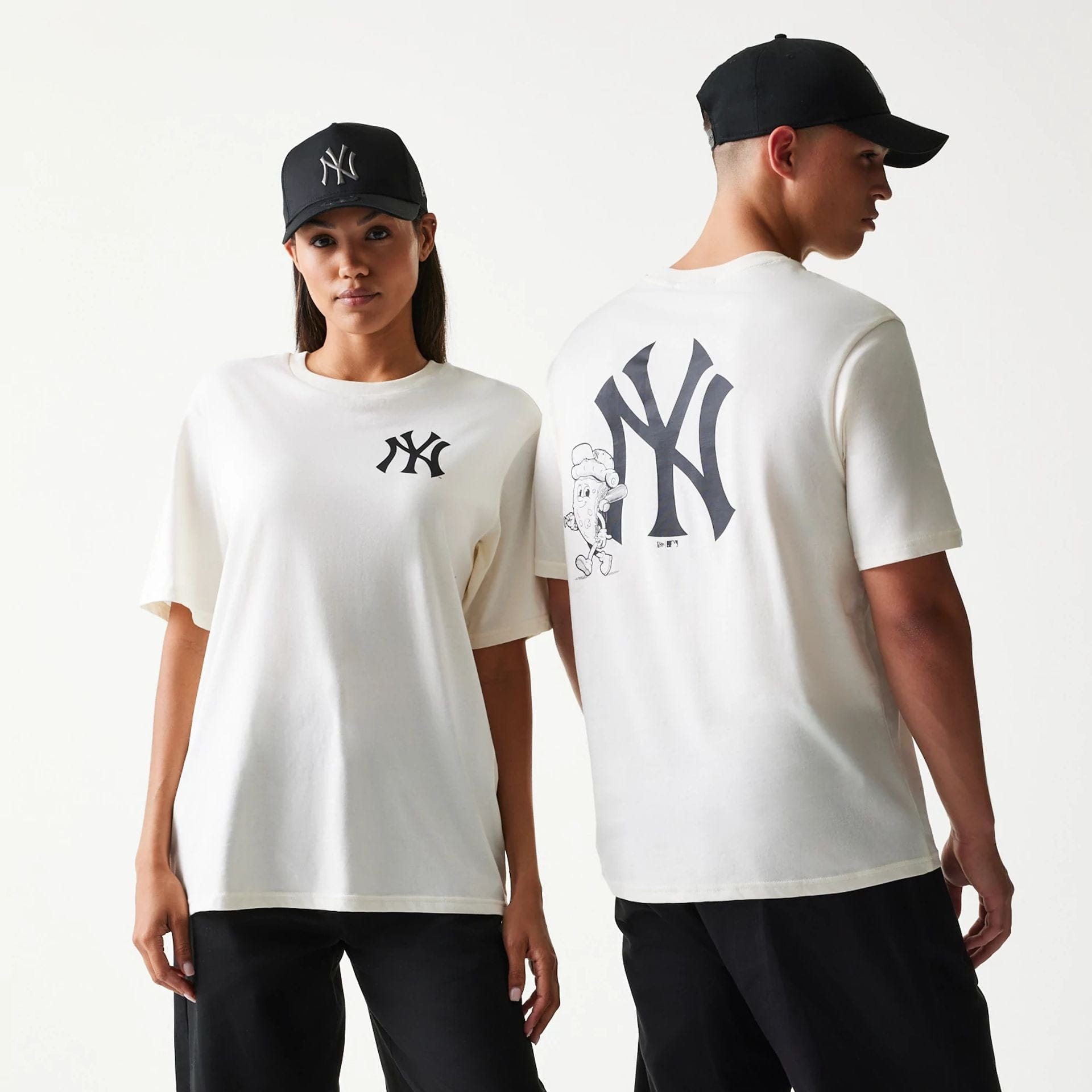 The model is wearing this MLB Food Graphic New York Yankees T-Shirt in open white. 1