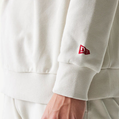 The model is wearing this NBA League Essential LA Lakers Oversized Crew Neck Sweater in cream. 5