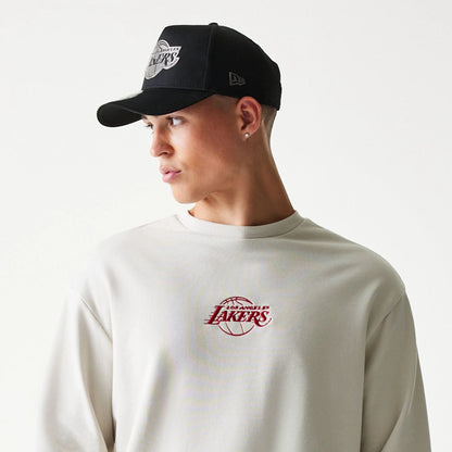 The model is wearing this NBA League Essential LA Lakers Oversized Crew Neck Sweater in cream. 6