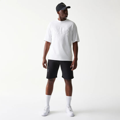The model is wearing this NBA Chicago Bulls Oversized T-Shirt in white. 8