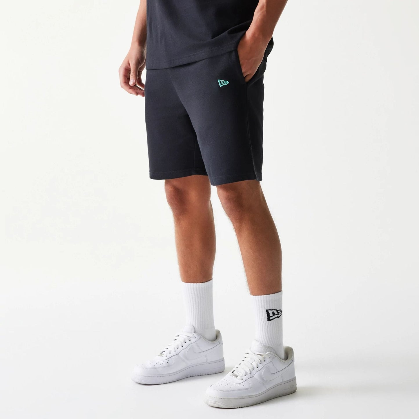 The model is wearing this NBA League Essential Chicago Bulls Shorts in black. 6