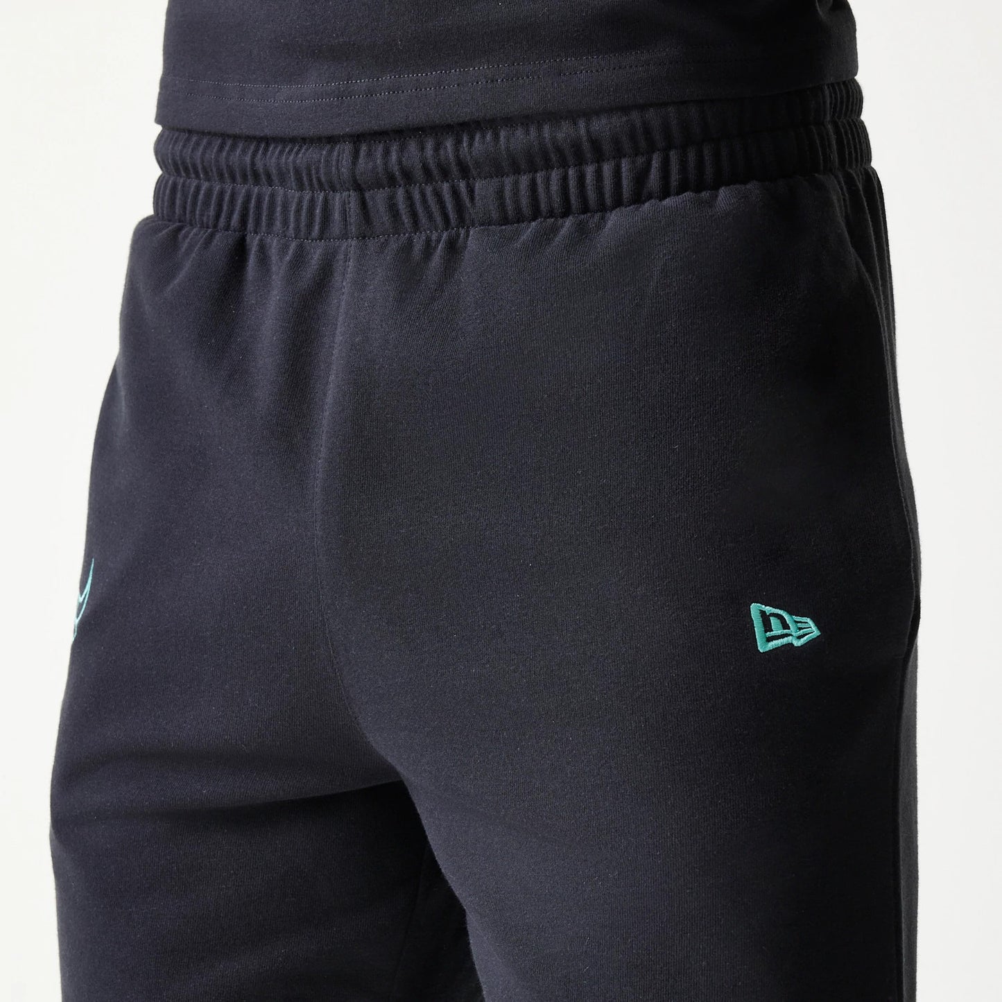 The model is wearing this NBA League Essential Chicago Bulls Shorts in black. 4