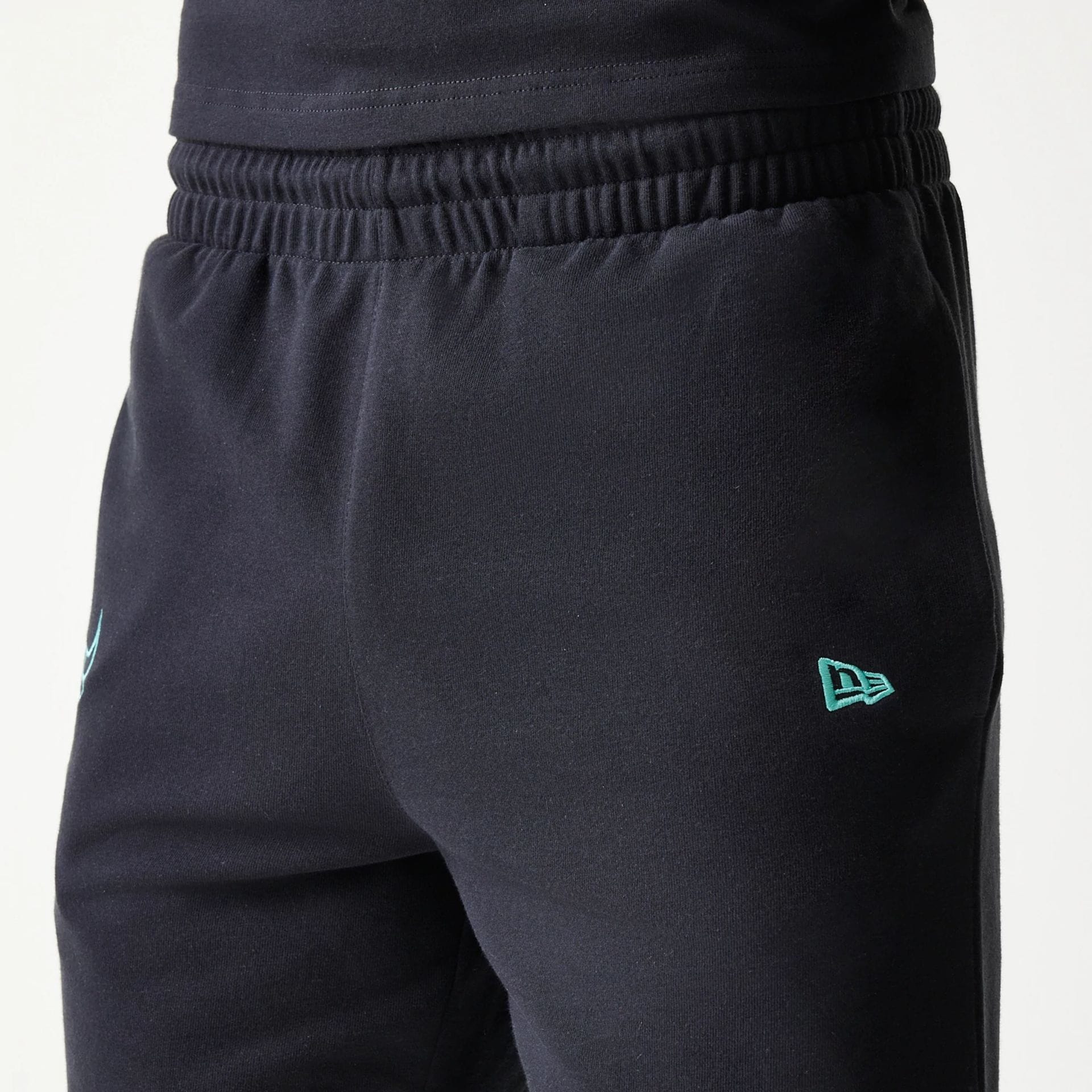The model is wearing this NBA League Essential Chicago Bulls Shorts in black. 4