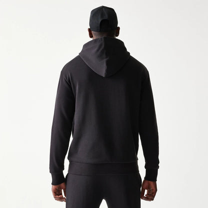 The model is wearing this NBA Chicago Bulls Oversized Pullover Hoodie in black. 2