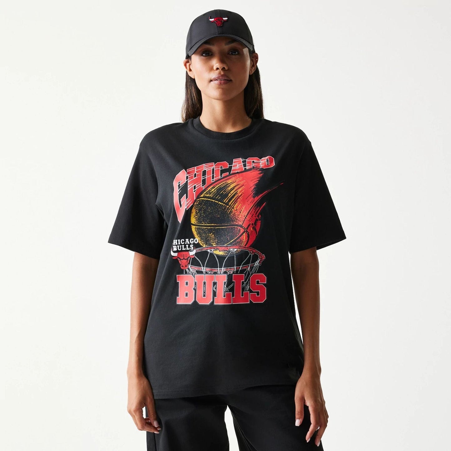 The model is wearing this NBA Ball Graphic Chicago Bulls T-Shirt in black. 4