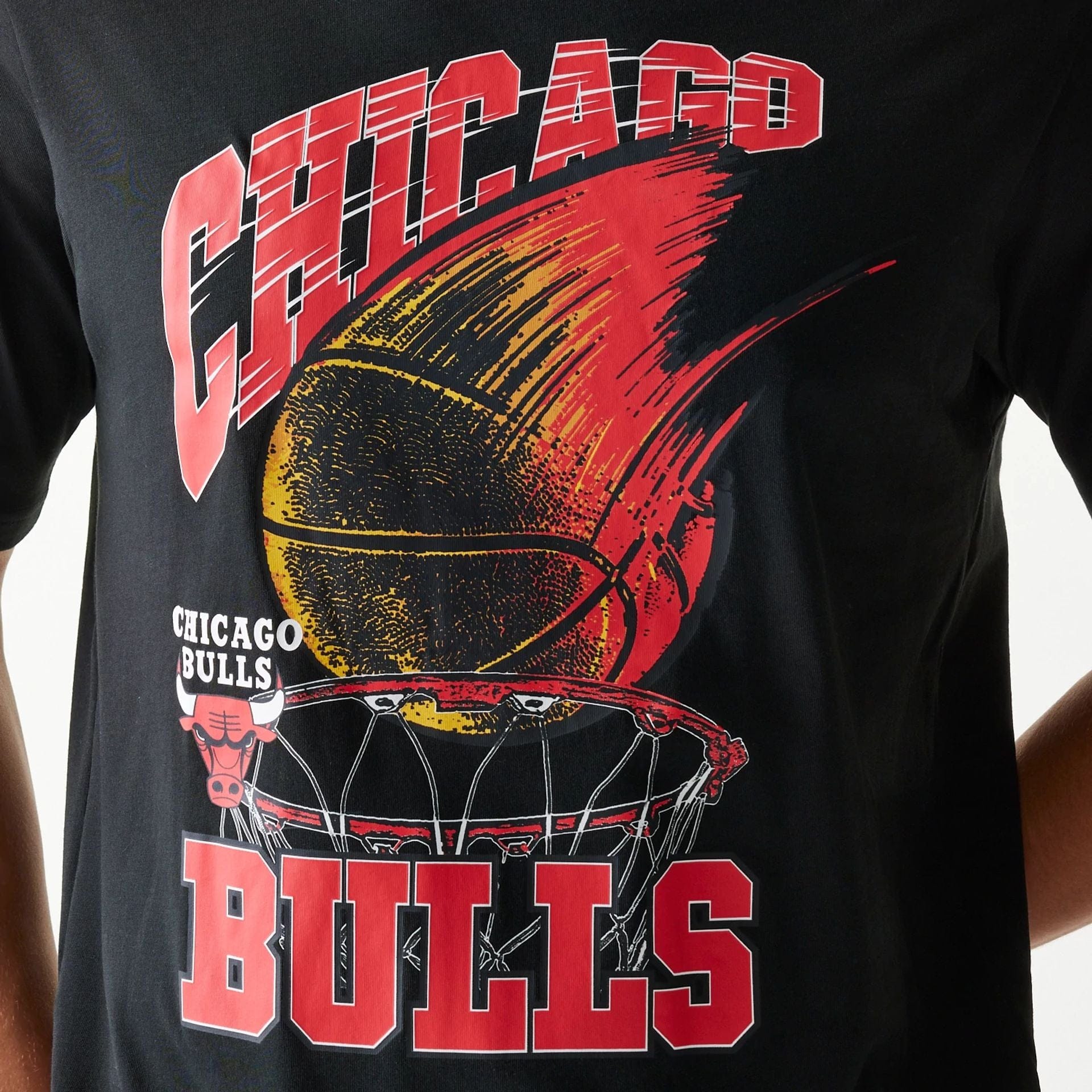 The model is wearing this NBA Ball Graphic Chicago Bulls T-Shirt in black. 8