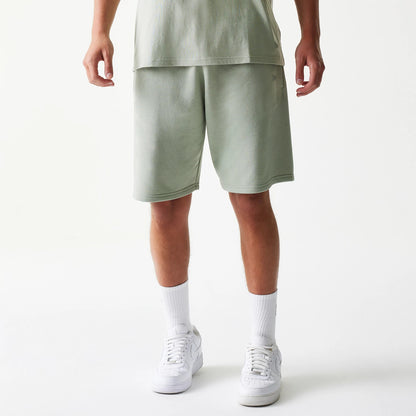 The model is wearing this NBA LA Lakers Shorts in pastel green. 1