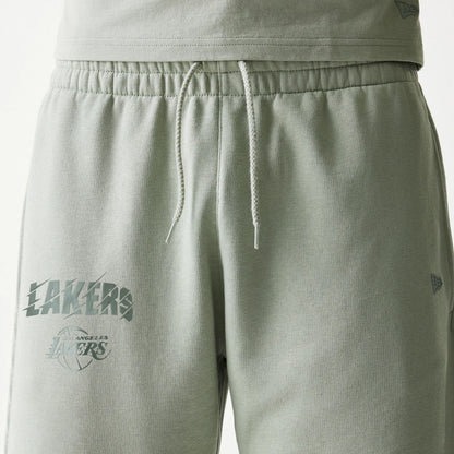 The model is wearing this NBA LA Lakers Shorts in pastel green. 3