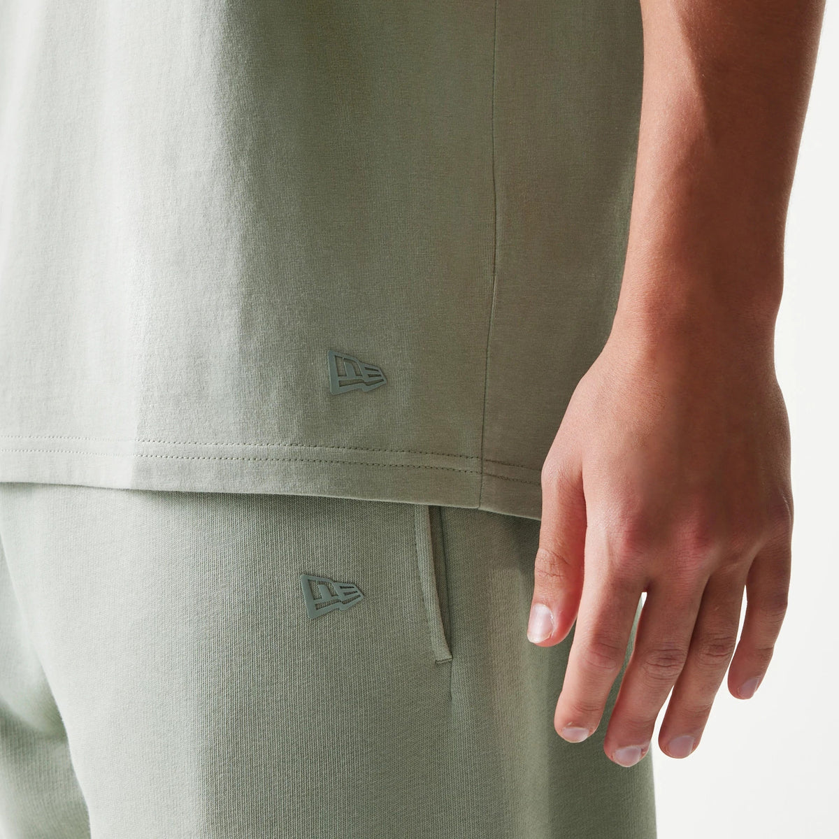 The model is wearing this NBA LA Lakers Sleeveless T-Shirt in pastel green. 5