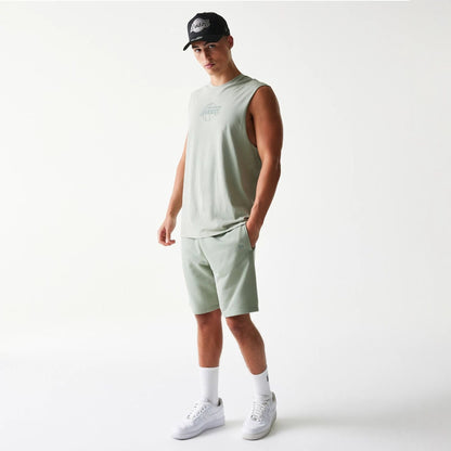 The model is wearing this NBA LA Lakers Sleeveless T-Shirt in pastel green. 8