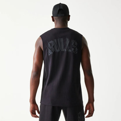 The model is wearing this NBA Chicago Bulls Sleeveless T-Shirt in black. 2