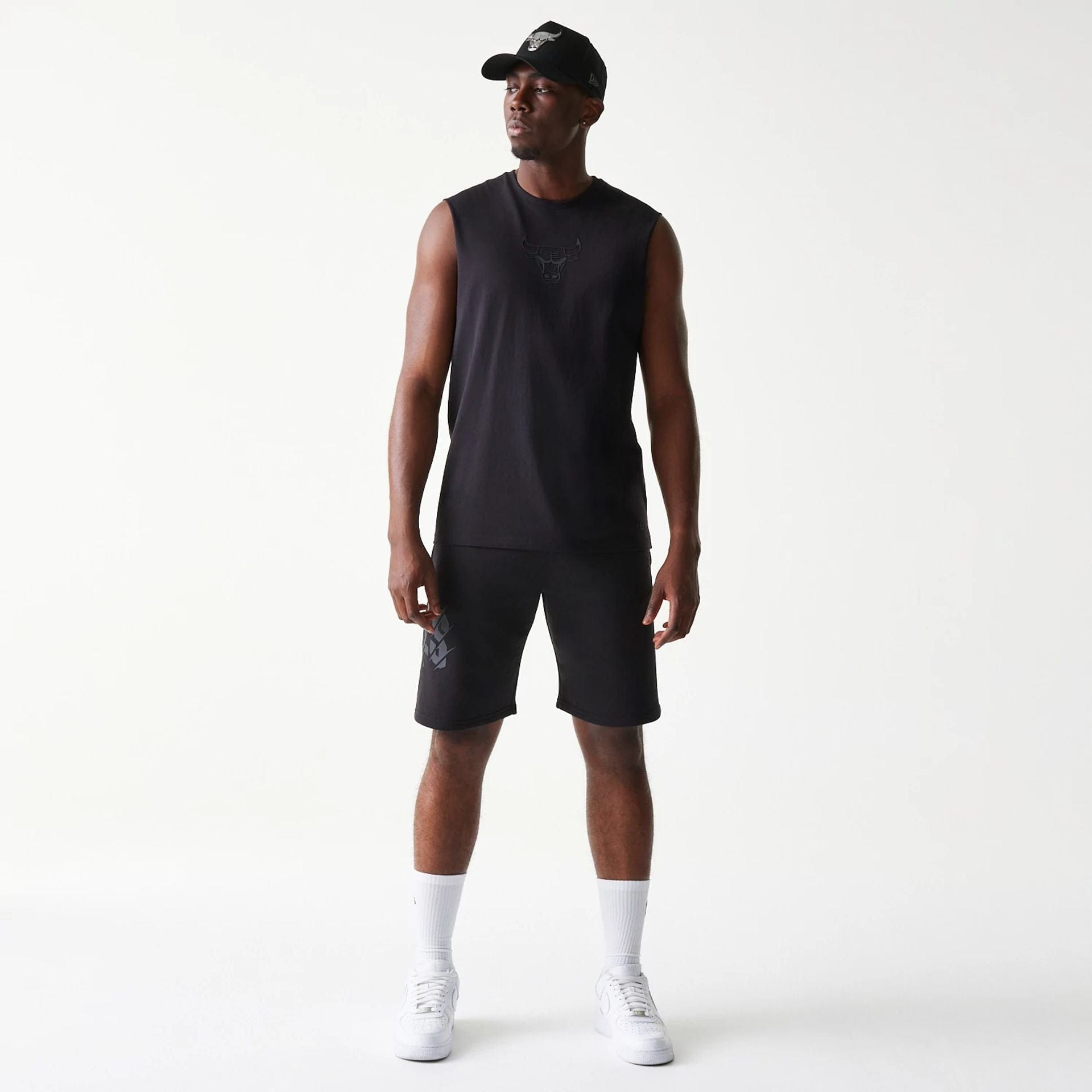 The model is wearing this NBA Chicago Bulls Sleeveless T-Shirt in black. 8