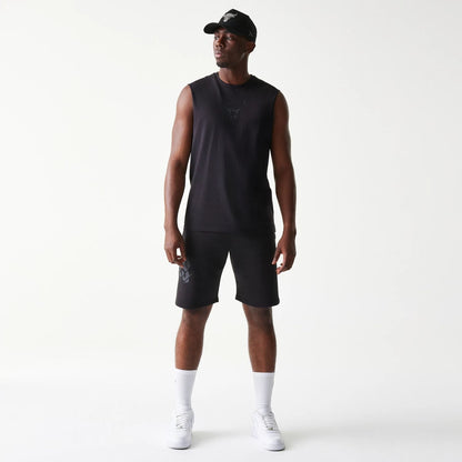 The model is wearing this NBA Chicago Bulls Sleeveless T-Shirt in black. 8