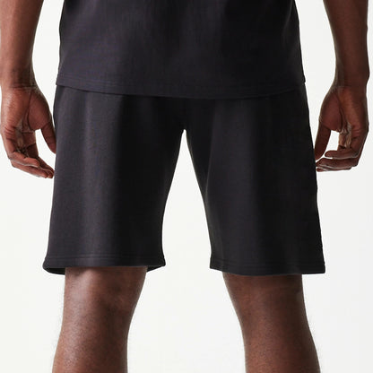 The model is wearing this NBA Chicago Bulls Shorts in black. 7
