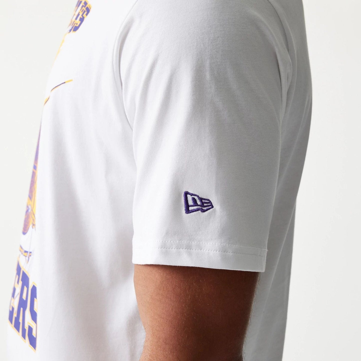 The model is wearing this NBA Ball Graphic LA Lakers T-Shirt in white. 7