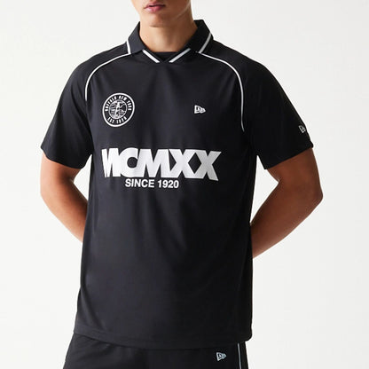 The model is wearing this New Era Football T-Shirt in black. 3