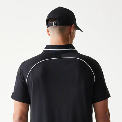 The model is wearing this New Era Football T-Shirt in black. 7