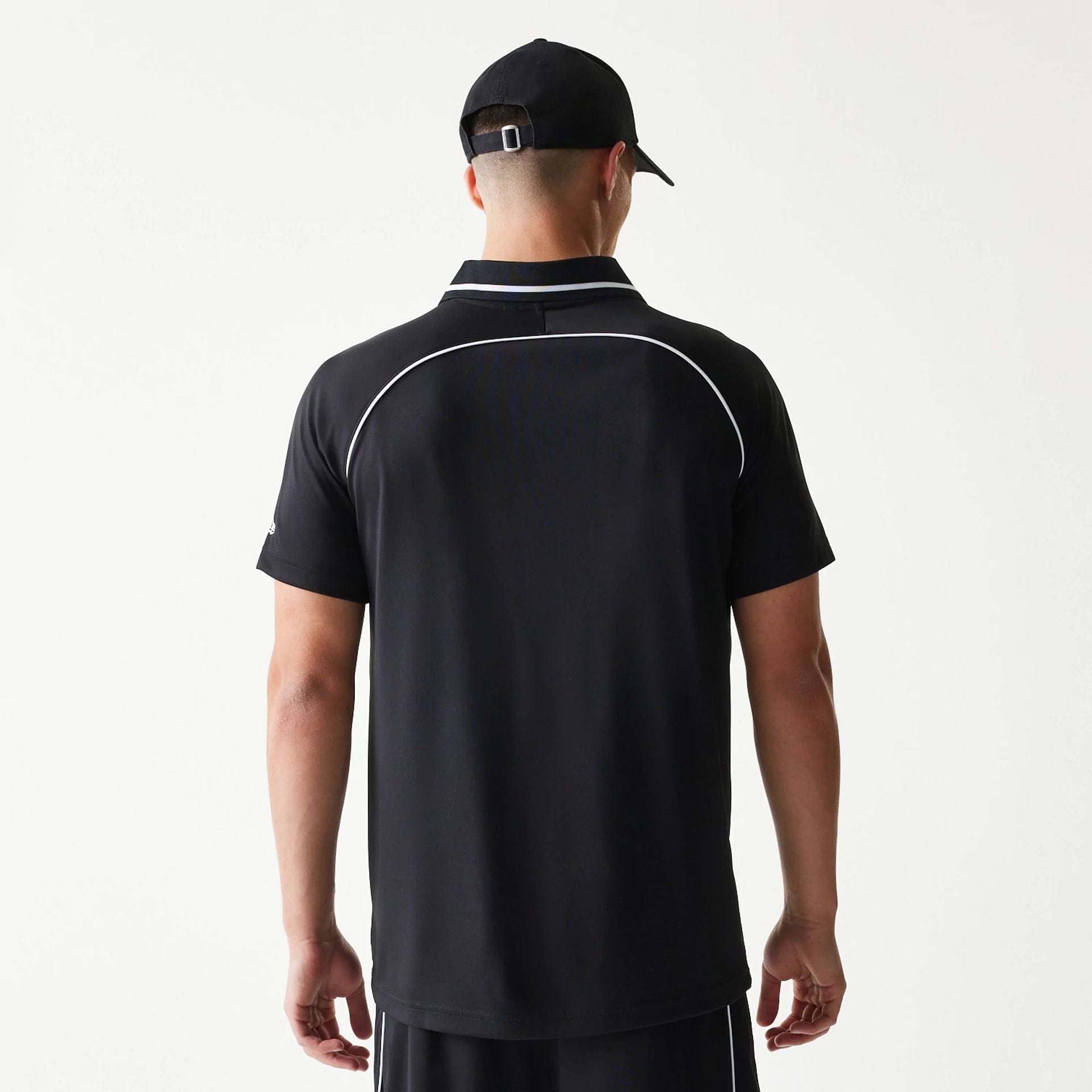 The model is wearing this New Era Football T-Shirt in black. 2
