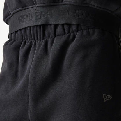 The model is wearing this New Era Tech Straight Leg Joggers in black on black. 6