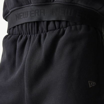 The model is wearing this New Era Tech Straight Leg Joggers in black. 6