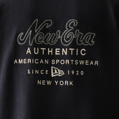 The model is wearing this New Era Graphic Polo T-Shirt in black. 6