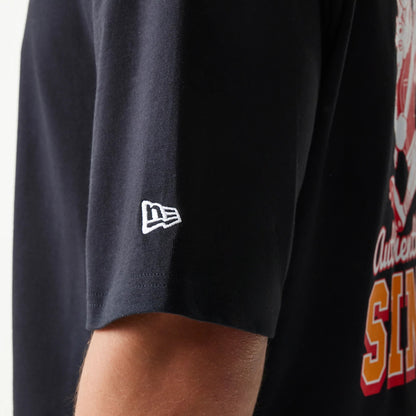 The model is wearing this New Era Baseball Cows Character Graphic Oversized T-Shirt in black. 7