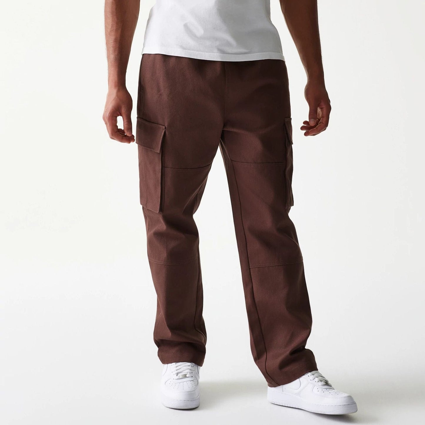 The model is wearing this New Era Straight Leg Cargo Joggers in brown. 1