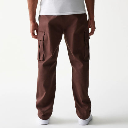The model is wearing this New Era Straight Leg Cargo Joggers in brown. 2