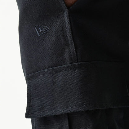 The model is wearing this New Era Straight Leg Cargo Joggers in black. 5