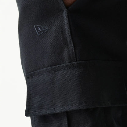 The model is wearing this New Era Straight Leg Cargo Joggers in black. 5