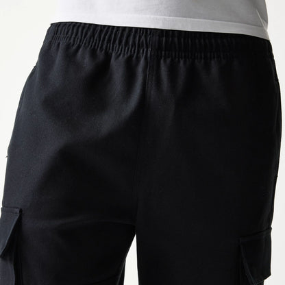 The model is wearing this New Era Straight Leg Cargo Joggers in black. 6