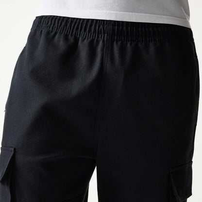 The model is wearing this New Era Straight Leg Cargo Joggers in black. 6