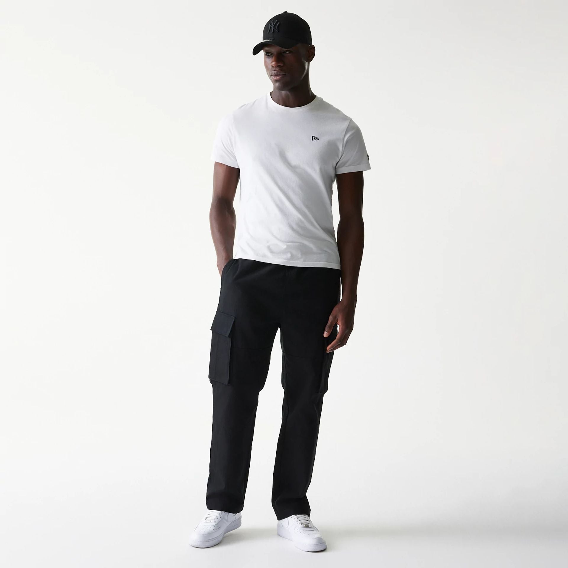 The model is wearing this New Era Straight Leg Cargo Joggers in black. 8