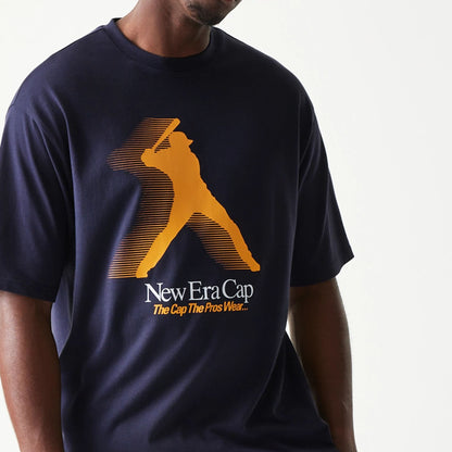 The model is wearing this New Era Baseball Player Graphic Oversized T-Shirt in navy. 3
