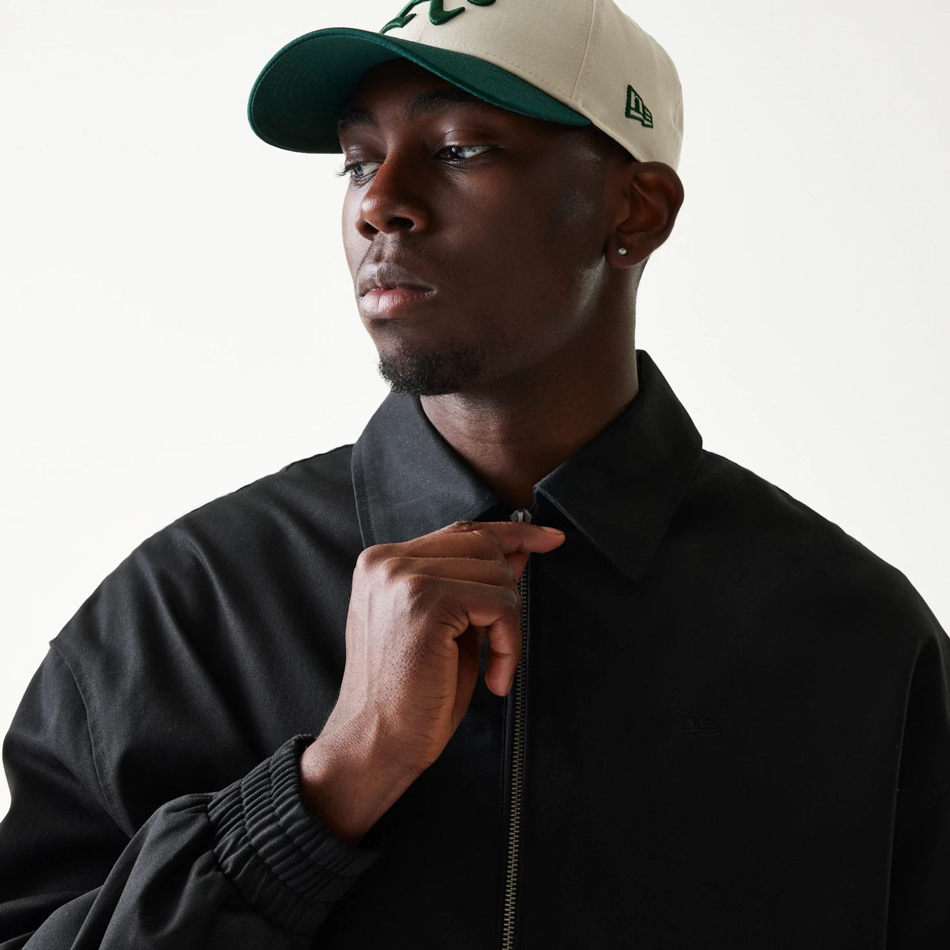 The model is wearing this New Era Collared Jacket in black. 6