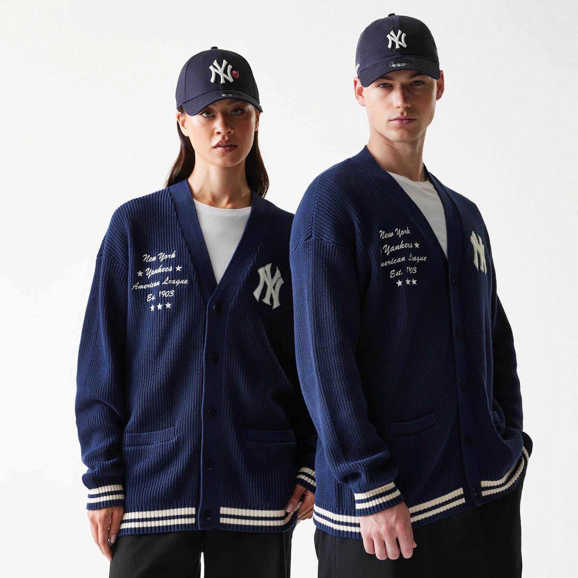 The model is wearing this MLB Collegiate New York Yankees Cardigan in navy. 1