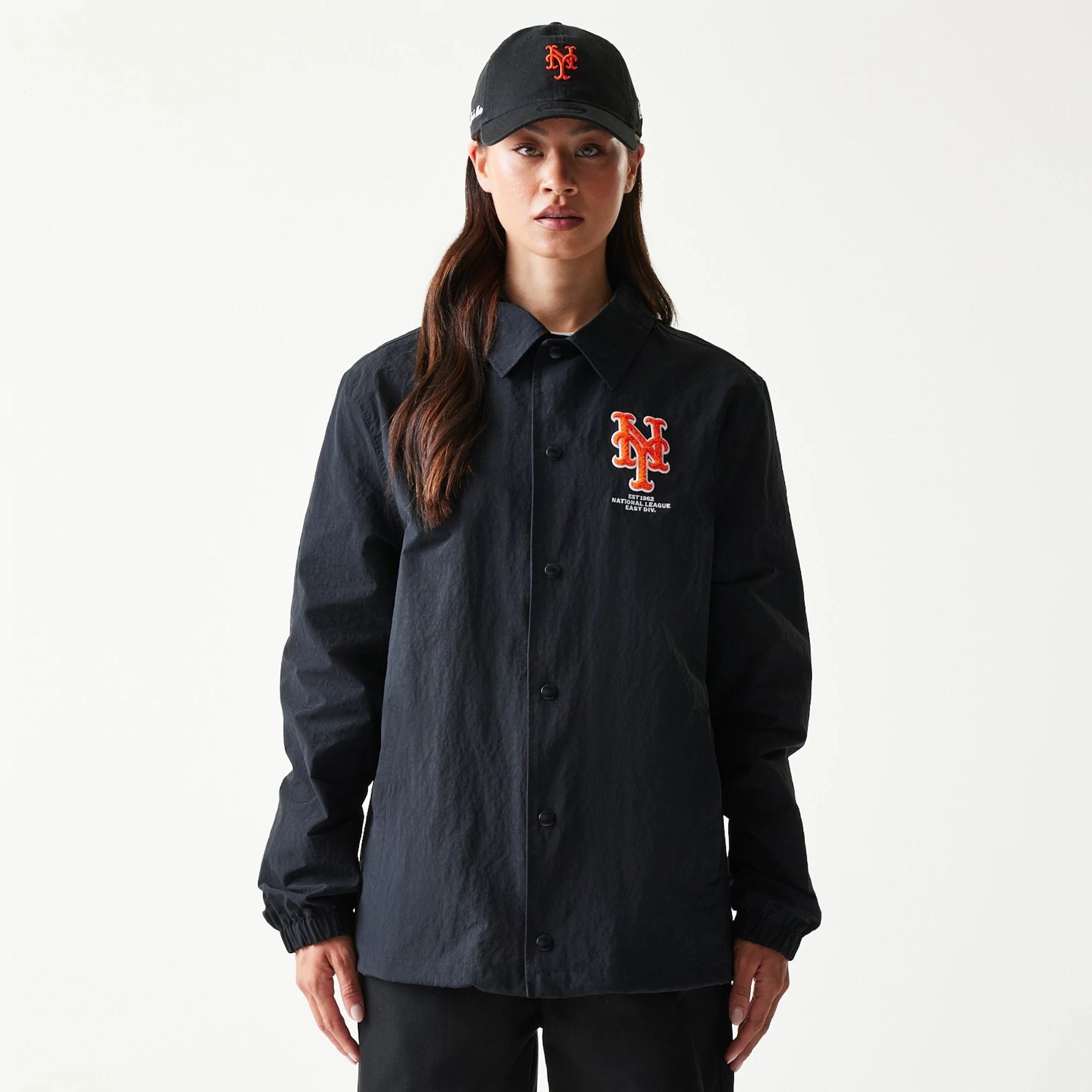 The model is wearing this MLB Coaches New York Mets Jacket in black. 4
