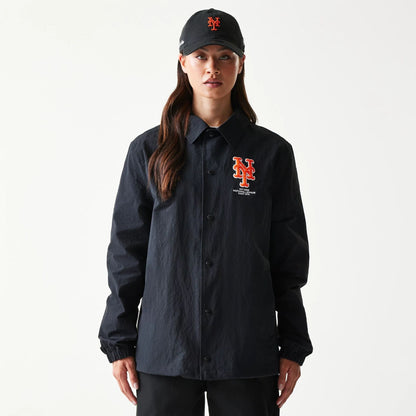 The model is wearing this MLB Coaches New York Mets Jacket in black. 4