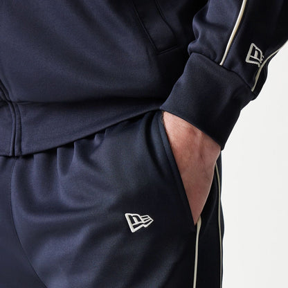 The model is wearing this MLB Piping New York Yankees Straight Leg Joggers in navy. 5