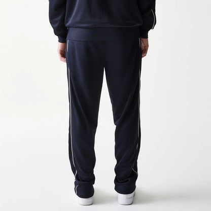The model is wearing this MLB Piping New York Yankees Straight Leg Joggers in navy. 2