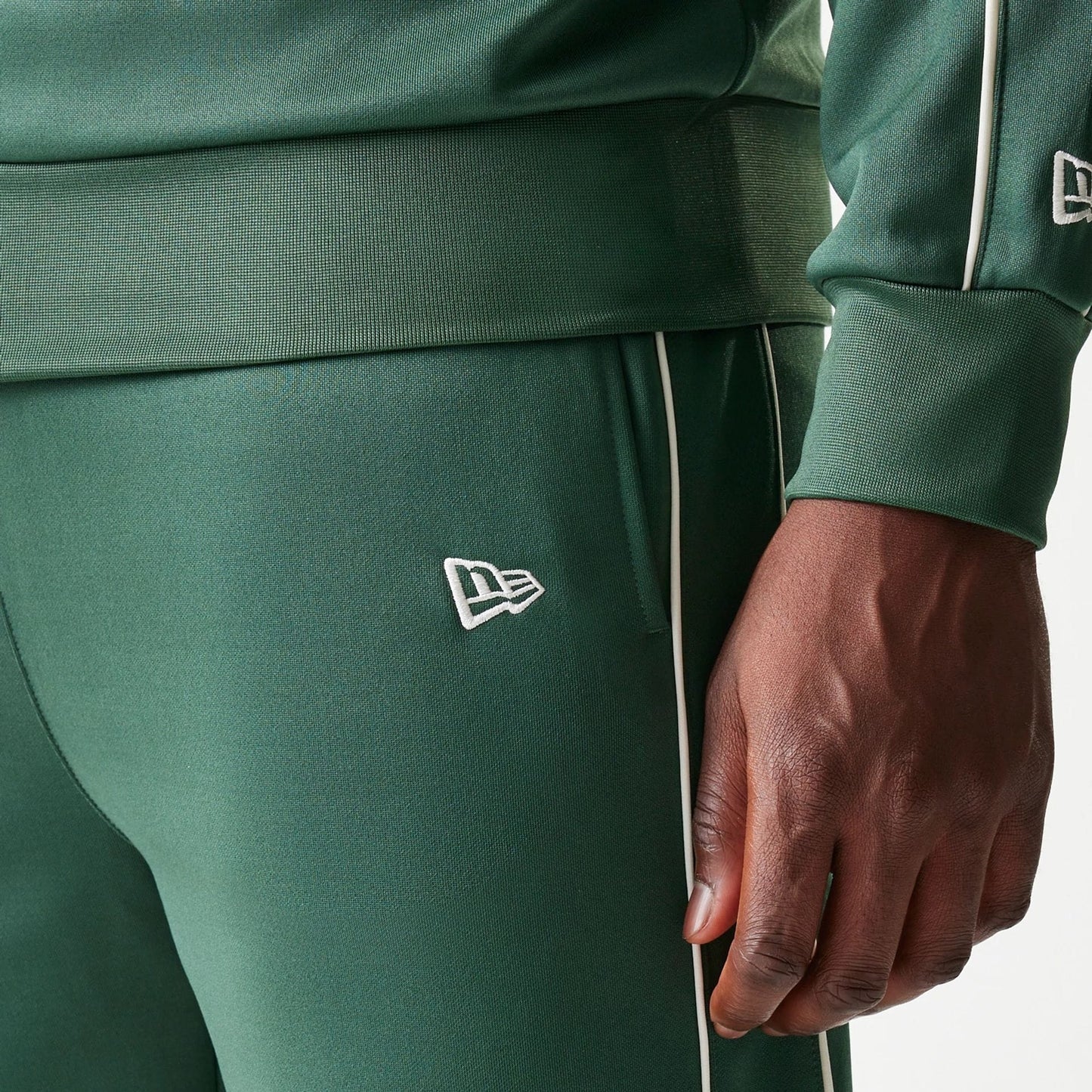 The model is wearing this MLB Piping LA Dodgers Straight Leg Joggers in dark green. 4