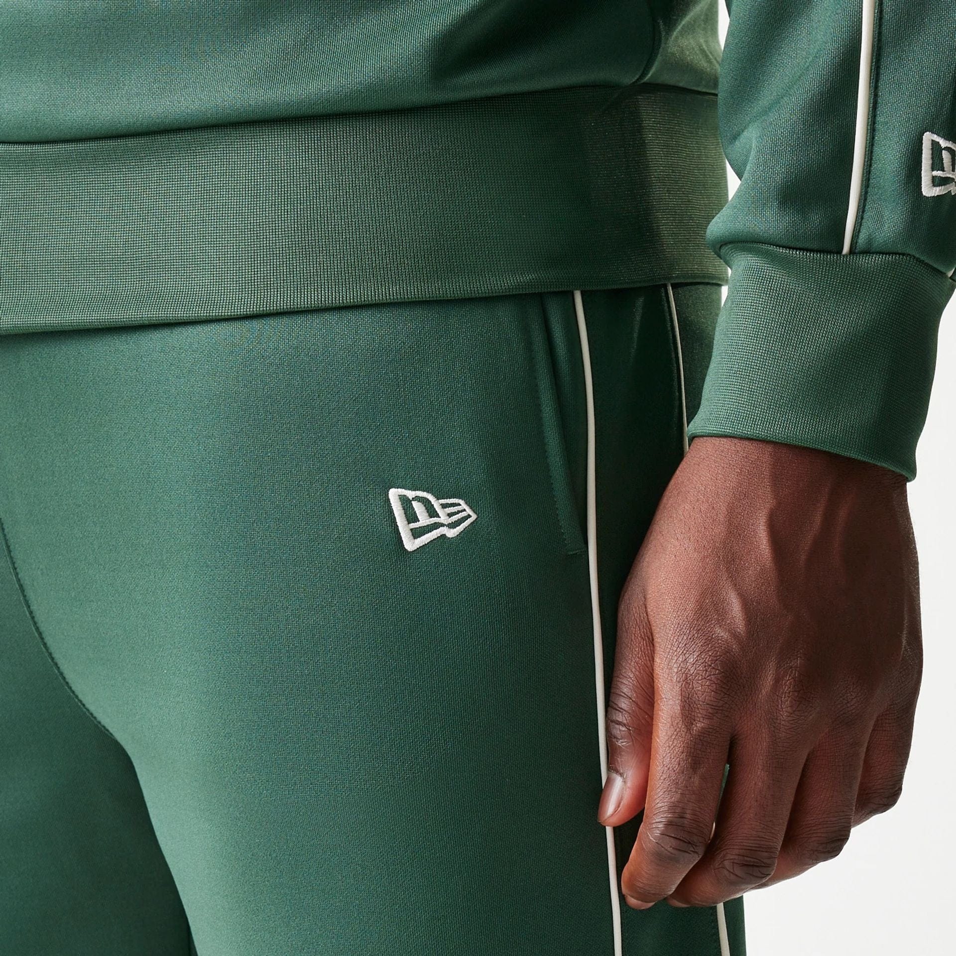 The model is wearing this MLB Piping LA Dodgers Straight Leg Joggers in dark green. 4