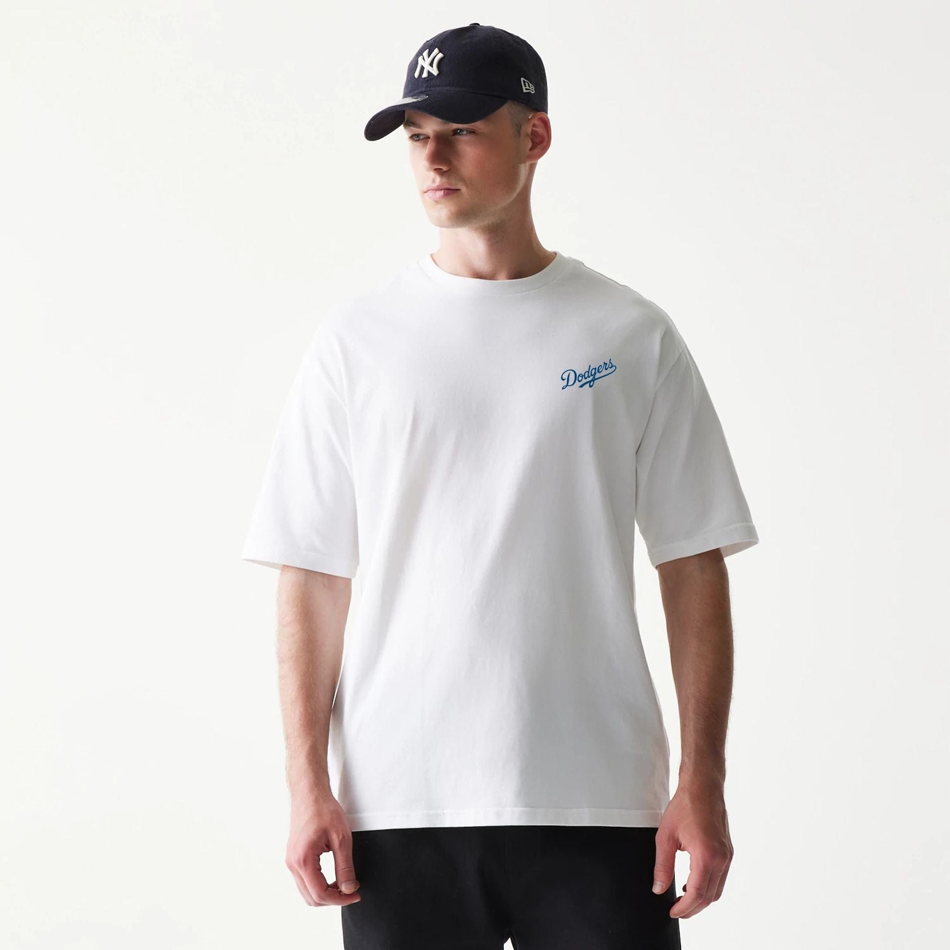 The model is wearing this MLB World Series LA Dodgers T-Shirt in white. 3