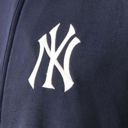 The model is wearing this MLB Piping New York Yankees Track Jacket in navy. 7