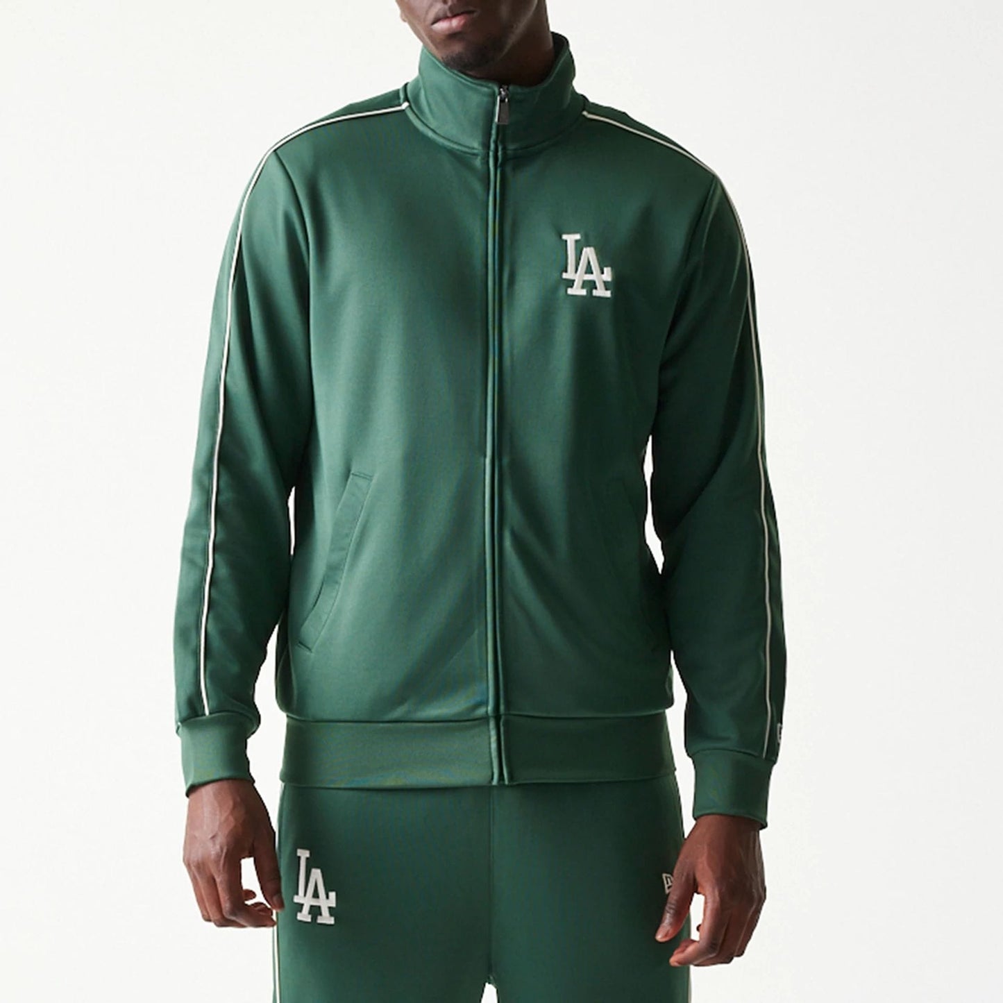 The model is wearing this MLB Piping LA Dodgers Track Jacket in dark green. 3