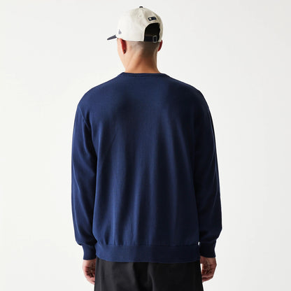 The model is wearing this MLB Essential New York Yankees Knitted Sweater in navy. 2