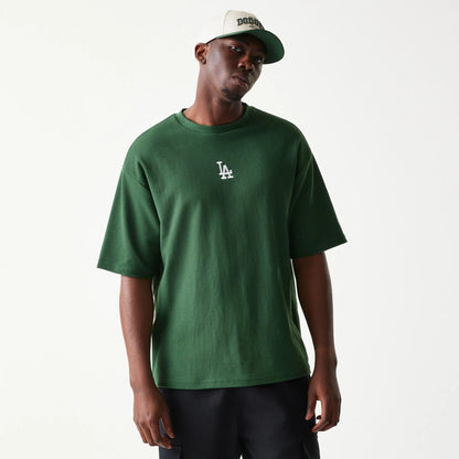 The model is wearing this MLB Waffle LA Dodgers Oversized T-Shirt in dark green. 1