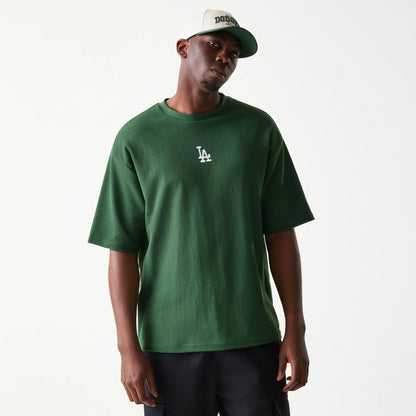 The model is wearing this MLB Waffle LA Dodgers Oversized T-Shirt in dark green. 1