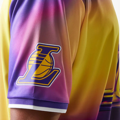 The model is wearing this NBA All Over Print LA Lakers T-Shirt in purple. 6